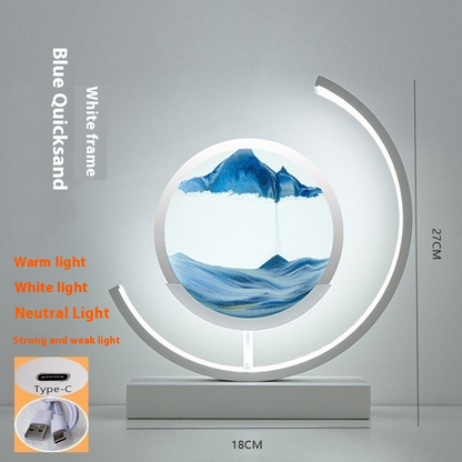 Dune Glow Sand Art Lamp lit up in a dark room